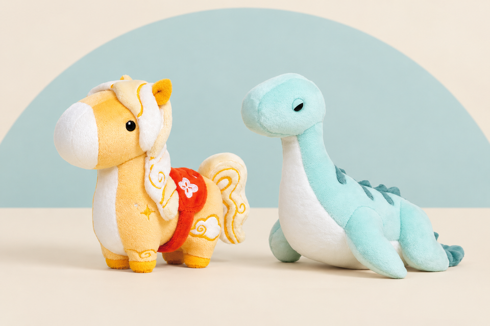 Mini Golden Horsi the Horse and Mini Nessi the Loch Ness Monster on a cream background with a soft blue curve